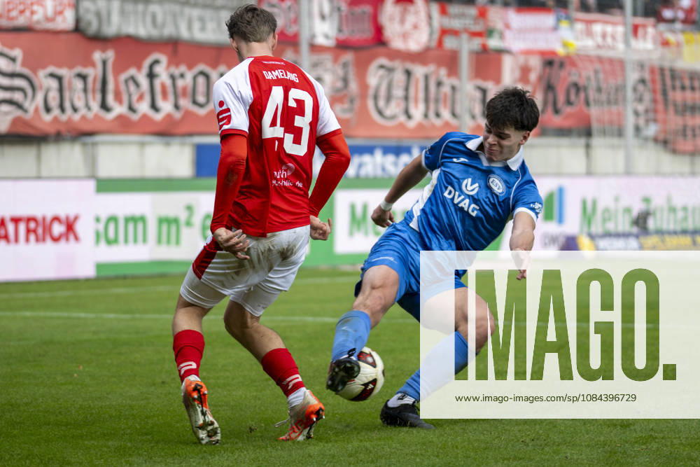 Regionalliga Northeast, Season 26-27: Hallescher FC vs. RSV Eintracht 1949 e.V., Halle, Germany, October 11, 2026. Pictured, from left: Juien Dammelang (Halle) and Kajetan Herrmann (RSV Halle), Saale-Leuna Chemie Stadium, Saxony-Anhalt, Germany