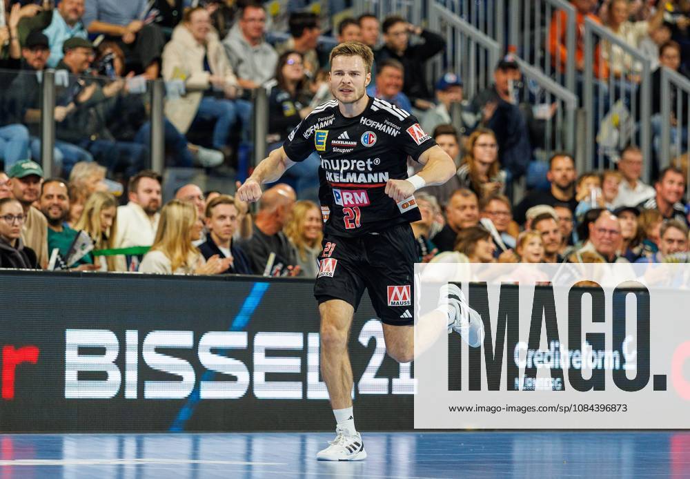 Handball 1st Bundesliga OPEL HBL 2026–2027 Season Matchday 8 HC Erlangen Nuremberg Metropolitan Region HCE MT Melsungen Women s Team Celebration Joy Christopher Bissel 21, HC Erlangen HCE clenches fist fists