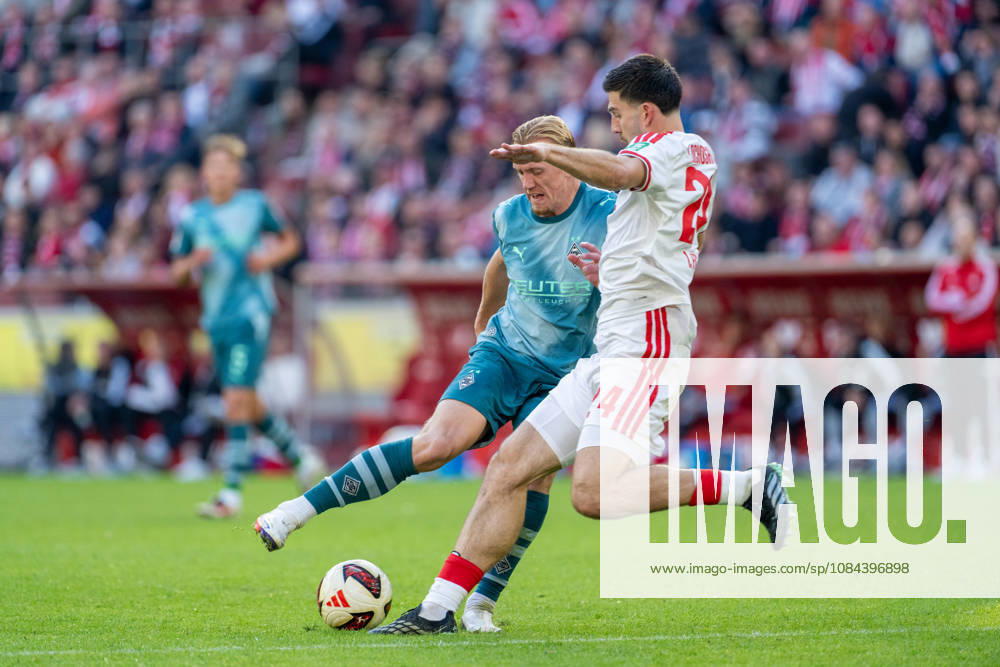 Isac Lidberg, Borussia Mönchengladbach, No. 03 in a tackle with Luka Lochoshvili of 1. FC Köln, No. 24 1. FC Köln vs. Borussia Mönchengladbach, Soccer, Bundesliga, Matchday 5, 2026–27 Season, October 12, 2026, DFL regulations prohibit any use of photographs as image sequences and or quasi-video, 1. FC Köln vs. Borussia Mönchengladbach, Soccer, Bundesliga, Matchday 5, 2026–27 Season, October 12, 2026, Cologne