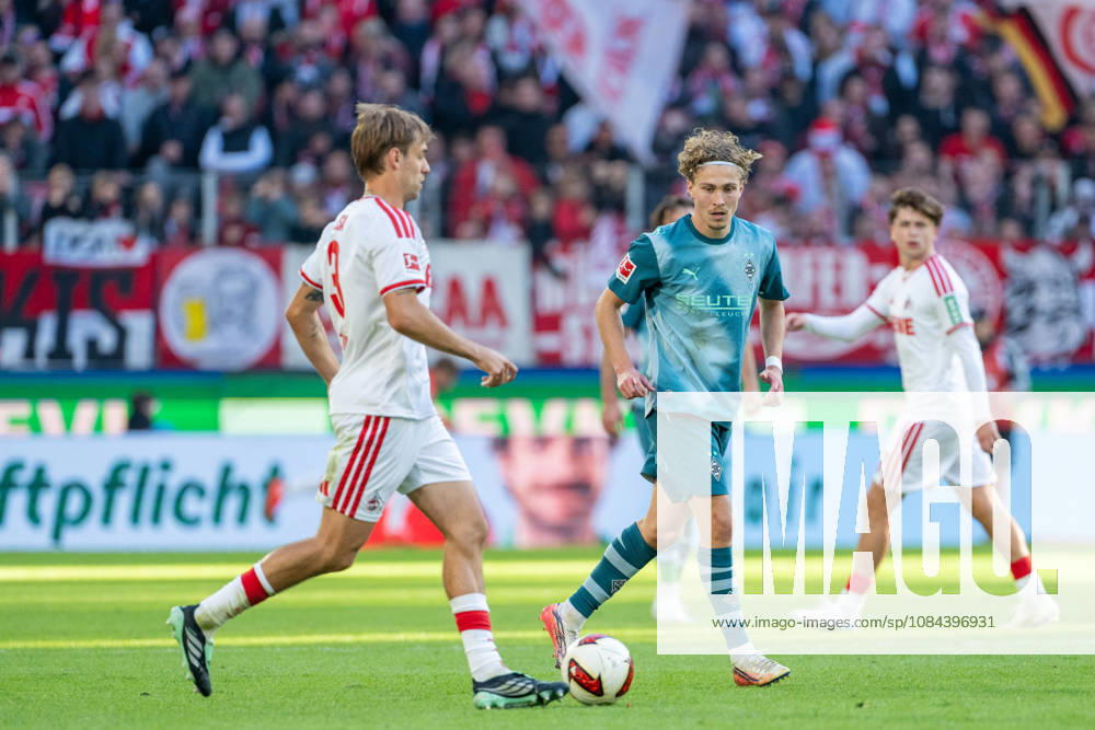 Julian Pauli (1. FC Köln), No. 03, in a tackle with Hugo Bolin (Borussia Mönchengladbach), No. 38; 1. FC Köln vs. Borussia Mönchengladbach, Soccer, Bundesliga, Matchday 5, 2026–27 season, October 12, 2026. DFL regulations prohibit any use of photographs as image sequences and or quasi-video, 1 FC Cologne vs. Borussia Mönchengladbach, Soccer, Bundesliga, Matchday 5, 2026–27 Season, October 12, 2026, Cologne