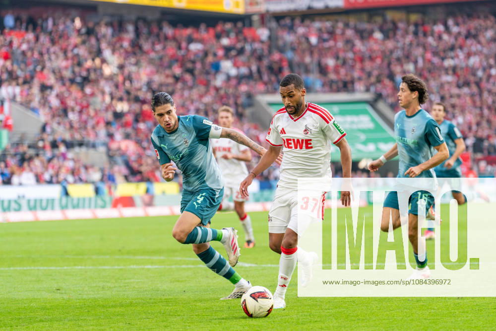 Kevin Diks of Borussia Mönchengladbach, No. 04, in a tackle with No. 37koem in the penalty area during the match between 1. FC Köln and Borussia Mönchengladbach, soccer, Bundesliga, Matchday 5, 2026–27 season, December 10, 2026, DFL regulations prohibit any use of photographs as image sequences and or quasi-video, 1. FC Köln vs. Borussia Mönchengladbach, Soccer, Bundesliga, Matchday 5, 2026–27 Season, October 12, 2026, Cologne