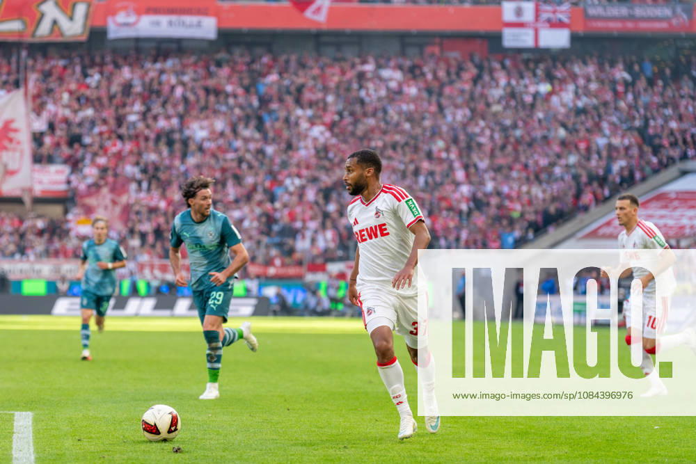 Linton Maina, 1. FC Köln, 37, looks for a teammate to pass to. 1. FC Köln vs. Borussia Mönchengladbach, Soccer, Bundesliga, Matchday 5, 2026–27 Season, December 10, 2026, DFL regulations prohibit any use of photographs as image sequences and or quasi-video, 1. FC Köln vs. Borussia Mönchengladbach, Soccer, Bundesliga, Matchday 5, 2026–27 Season, December 10, 2026, Cologne
