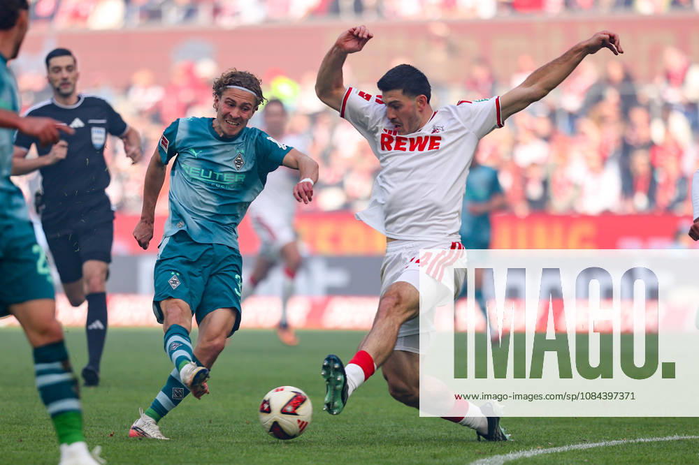 Soccer, Bundesliga, 1. FC Köln vs. Borussia Mönchengladbach, RheinEnergieSTADION, Matchday 5, 2026–2027 Season: Hugo Bolin (Borussia Mönchengladbach, No. 38) in a tackle against Luka Lochoshvili (1. FC Köln, No. 24). DFB regulations prohibit any use of photographs as image sequences and or quasi-video. Photo: WilkowskixPressefotoKochx, North Rhine-WestGermany