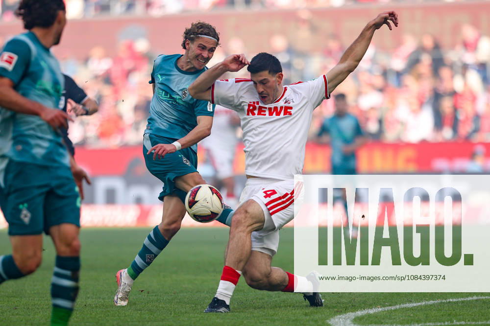 Soccer, Bundesliga, 1. FC Köln vs. Borussia Mönchengladbach, RheinEnergieSTADION, Matchday 5, 2026–2027 Season: Hugo Bolin (Borussia Mönchengladbach, No. 38) in a tackle against Luka Lochoshvili (1. FC Köln, No. 24). DFB regulations prohibit any use of photographs as image sequences and or quasi-video. Photo: WilkowskixPressefotoKochx, North Rhine-WestGermany