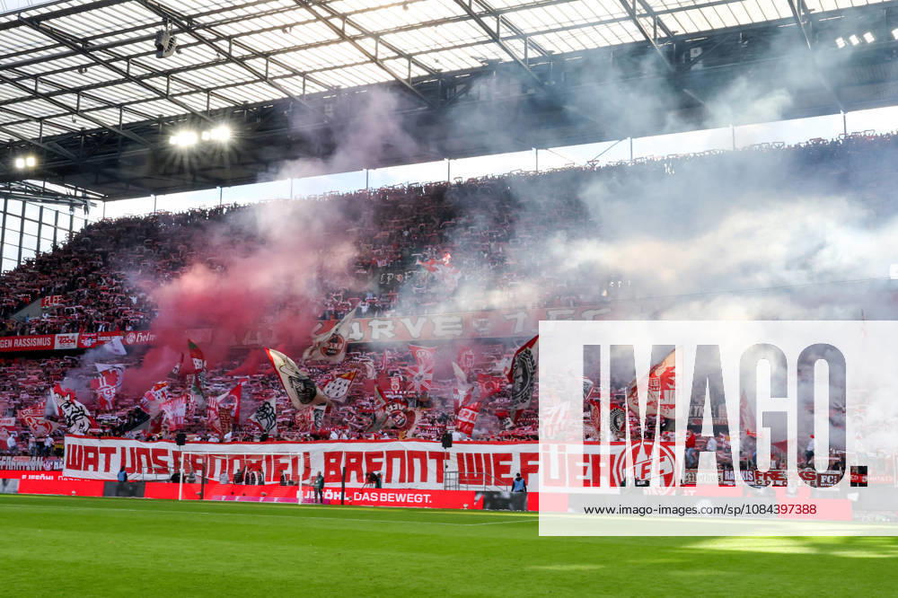 Soccer, Bundesliga, 1. FC Köln vs. Borussia Mönchengladbach, RheinEnergieSTADION, Matchday 5, 2026–2027 season. Choreographed display with pyrotechnics in the Cologne fans’ section. DFB regulations prohibit any use of photographs as image sequences and or quasi-video. Photo: WilkowskixPressefotoKochx, North Rhine-Westphalia, Germany
