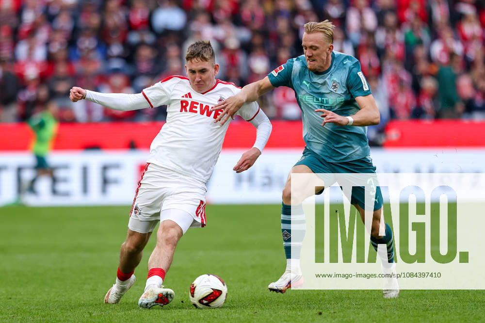 Soccer, Bundesliga, 1. FC Köln vs. Borussia Mönchengladbach, RheinEnergieSTADION, Matchday 5, 2026–2027 Season: Isac Lidberg (Borussia Mönchengladbach) 3 in a tackle against Isak Johannesson (1. FC Köln) 8. DFB regulations prohibit any use of photographs as image sequences and or quasi-video. Photo: WilkowskixPressefotoKochx, North Rhine-Westphalia Germany