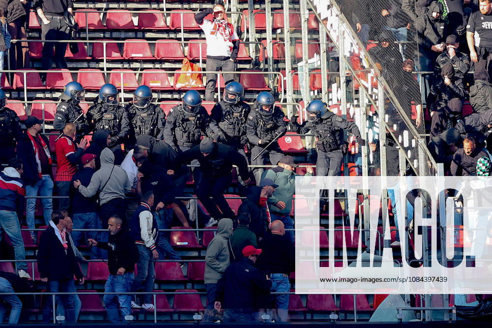 Soccer, Bundesliga, 1. FC Köln vs. Borussia Mönchengladbach, RheinEnergieSTADION, Matchday 5, 2026–2027 season: A brawl in the upper stands between Cologne and Mönchengladbach fans is broken up by police. DFB regulations prohibit any use of photographs as image sequences and or quasi-video. Photo: WilkowskixPressefotoKochx, North Rhine-Westphalia, Germany