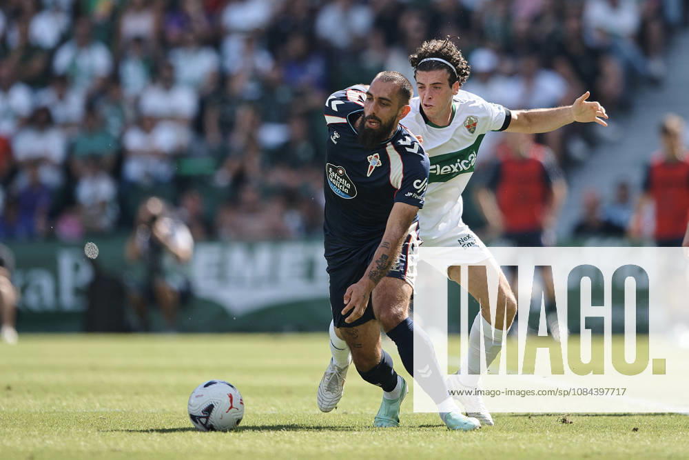 Elche CF v RC Celta de Vigo - LaLiga EA Sports ELCHE, SPAIN - OCTOBER 11: Javi Morcillo of Elche CF competes for the ball with Borja Iglesias of Celta de Vigo during to the LaLiga 2026 27 EA Sports match between Elche CF and RC Celta de Vigo at Manuel Martinez Valero Stadium on October 11, 2026, in Elche, Spain. (Photo by Francisco Macia Photo Players Images Magara Press) Elche Martinez Valero Stadium Spain