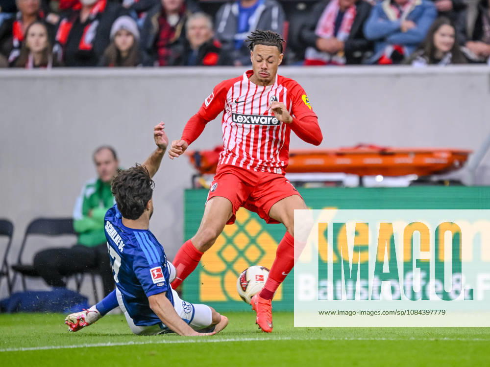 Adrian Gantenbein of FC Schalke 04 and Derry Scherhant of SC Freiburg battle for the ball during the Bundesliga match between Sport Club Freiburg and FC Schalke 04 at Europa-Park Stadium on October 11, 2026, in Freiburg im Breisgau, Germany Photo by Harry Langer DeFodi Images Adrian Gantenbein of FC Schalke 04 and Derry Scherhant of SC Freiburg battle for the ball during the Bundesliga match between Sport Club Freiburg and FC Schalke 04 at Europa Park Stadion on October 11, 2026, in Freiburg im Breisgau, Germany. Photo by Harry Langer, DeFodi Images. DFB and DFL regulations prohibit any use of photographs as image sequences and or quasi-video. Photo by Harry Langer, DeFodi Images. DFB and DFL regulations prohibit any use of photographs as imSEQUENCES AND OR QUASI-VIDEO