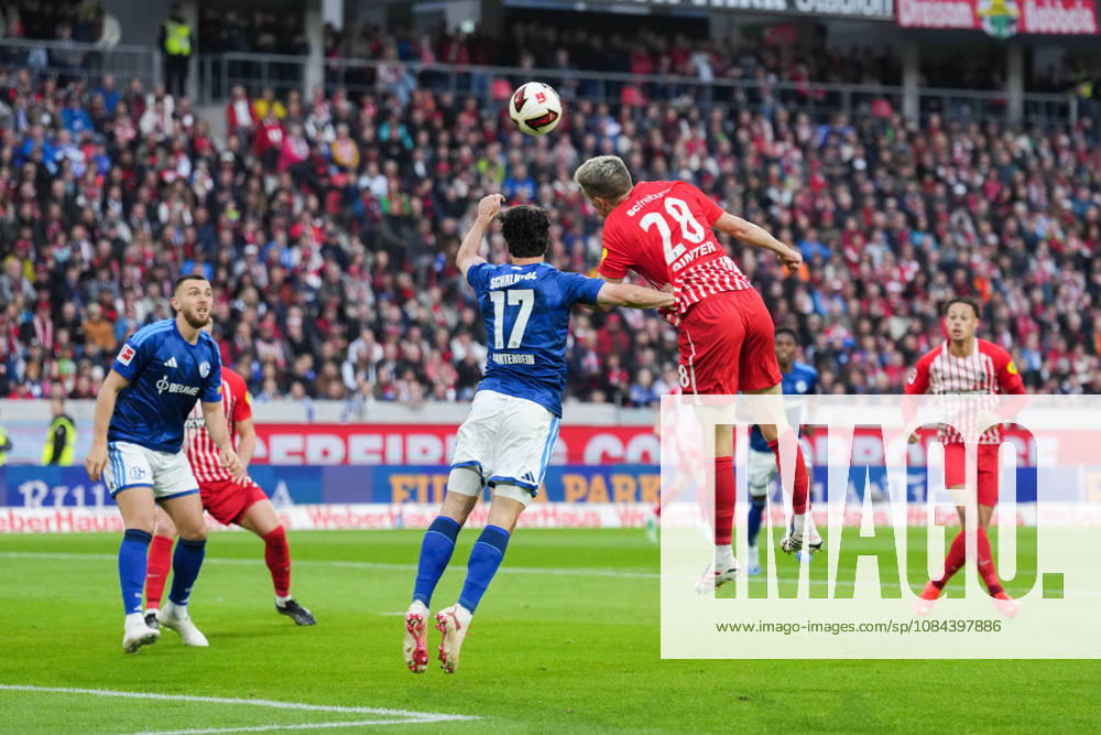 1 Bundesliga: SC Freiburg vs. FC Schalke 04, October 11, 2026—Heading duel between Adrian Gantenbein (FC Schalke 04, No. 17) and Matthias Ginter (SC Freiburg, No. 28). 1 Bundesliga: SC Freiburg vs. FC Schalke 04, Europa-Park Stadium, October 11, 2026 DFB and DFL regulations prohibit any use of photographs as image sequences and or quasi-video.