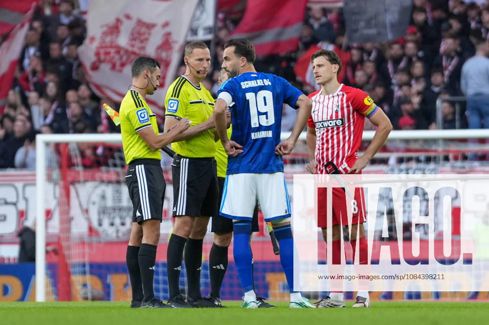 Kenan Karaman (FC Schalke 04), 19, and Maximilian Eggestein (SC Freiburg), 08, with referee Martin Petersen, Germany, soccer, Bundesliga 1, Matchday 5, 2026–2027, SC Freiburg vs. FC Schalke 04, October 11, 2026, Europa-Park Stadium, Freiburg, Baden-Württemberg, Germany
