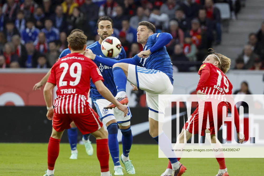 Philipp Treu (SC Freiburg), 29, Kenan Karaman (FC Schalke), 19, Robin Gosens (FC Schalke), 08, and Niklas Beste (SC Freiburg), 19, battling for the ball, Germany, soccer, Bundesliga 1, Matchday 5, 2026–2027, SC Freiburg vs. FC Schalke 04, October 11, 2026, Freiburg im Breisgau, Europa-Park Stadium, Germany
