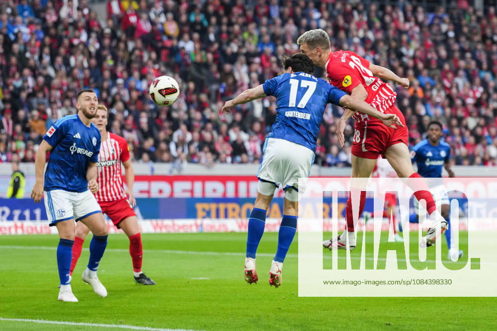1 Bundesliga: SC Freiburg vs. FC Schalke 04, October 11, 2026—Heading duel between Adrian Gantenbein (FC Schalke 04, No. 17) and Matthias Ginter (SC Freiburg, No. 28). 1 Bundesliga: SC Freiburg vs. FC Schalke 04, Europa-Park Stadium, October 11, 2026 DFB and DFL regulations prohibit any use of photographs as image sequences and or quasi-video.