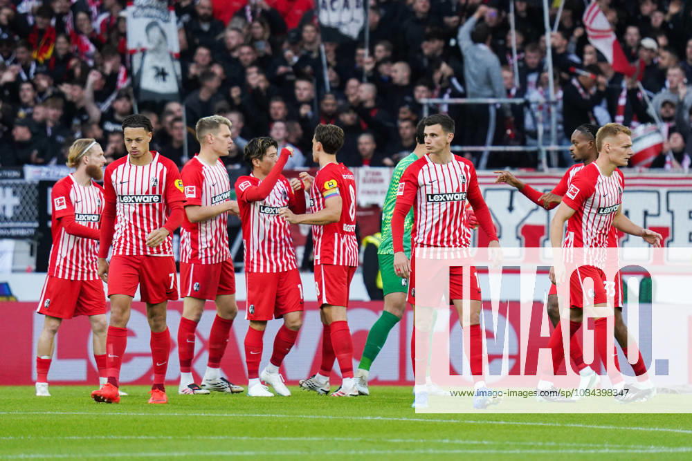 1 Bundesliga: SC Freiburg vs. FC Schalke 04, October 11, 2026. The Freiburg players high-fiving each other before the game. 1 Bundesliga: SC Freiburg vs. FC Schalke 04, Europa-Park Stadium, October 11, 2026 DFB and DFL regulations prohibit any use of photographs as image sequences and or quasi-video.
