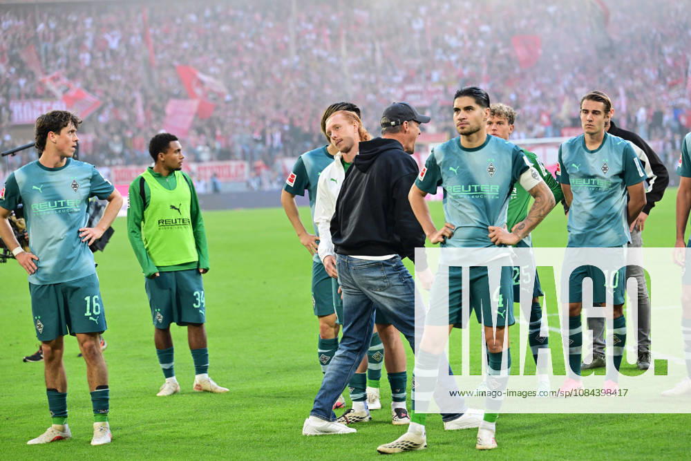Cologne Soccer, Men s, 2026–2027 Season, 1. FC Cologne vs. Borussia Mönchengladbach Huge disappointment: Disappointment among Gladbach fans in the fan section after the game. Alexander Blessin, Gladbach coach, center, brings back players who had already been about to leave the field. DFL regulations prohibit any use of photographs as image sequences and or quasi-video. Rhein Energie Stadium, North Rhine-Westphalia, Germany