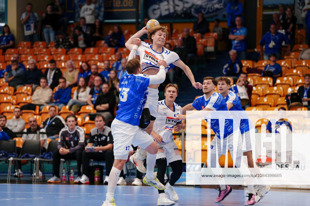 2nd Handball Bundesliga, Matchday 7: Dessau Roßlauer HV 06 vs. VfL Lübeck Schwartau; Magnus Holpert (VfL Lübeck Schwartau), No. 22 is guarded by Valentin Neagu of Dessau Roßlauer HV 06, No. 13 on October 11, 2026, at the Anhalt Arena, Dessau Roßlau, Saxony-Anhalt, Dessau Roßlau, Anhalt Arena, Saxony-Anhalt, Germany