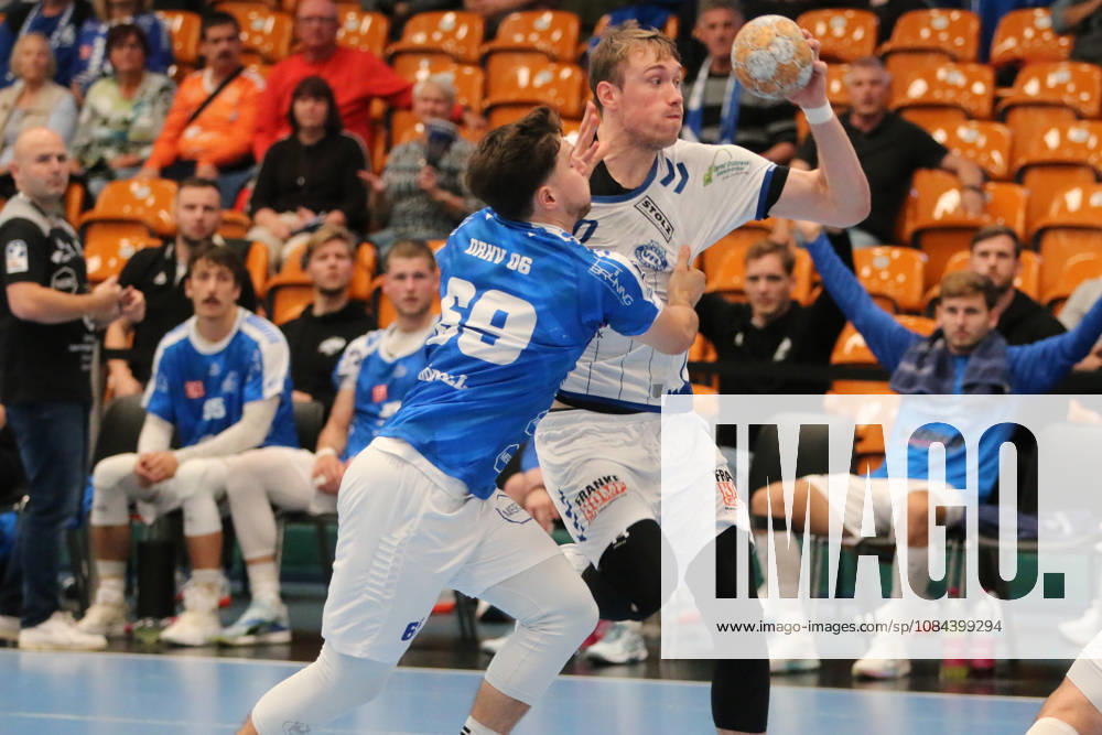 Men s Handball 2026–2027, 2nd Division, Matchday 7: Dessau Roßlauer HV 06 vs. VfL Lübeck Schwartau at Anhalt Arena, Dessau. Ole Hagedorn (Lübeck), 10, in a one-on-one battle with Niklas Döbbel (Dessau, 69, blue) Dessau Roßlau Saxony-Anhalt Germany