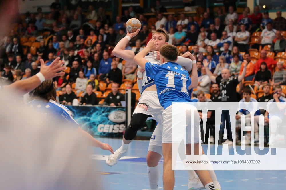 Men s Handball 2026–2027, 2nd Division, Matchday 7: Dessau Roßlauer HV 06 vs. VfL Lübeck Schwartau at Anhalt Arena, Dessau. Ole Hagedorn (Lübeck), 10, in a one-on-one battle with Alen Hadzimuhamedovic (Dessau, 11, blue) Dessau Roßlau Saxony-Anhalt Germany