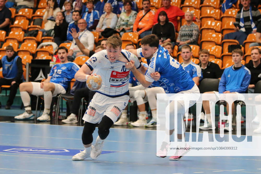 Men s Handball 2026–2027, Handball Bundesliga, Matchday 7: Dessau Roßlauer HV 06 vs. VfL Lübeck Schwartau at Anhalt Arena, Dessau. Ole Hagedorn (Lübeck), 10, in a duel with Niklas Döbbel (Dessau, 69, blue) Dessau, Saxony-Anhalt, Germany
