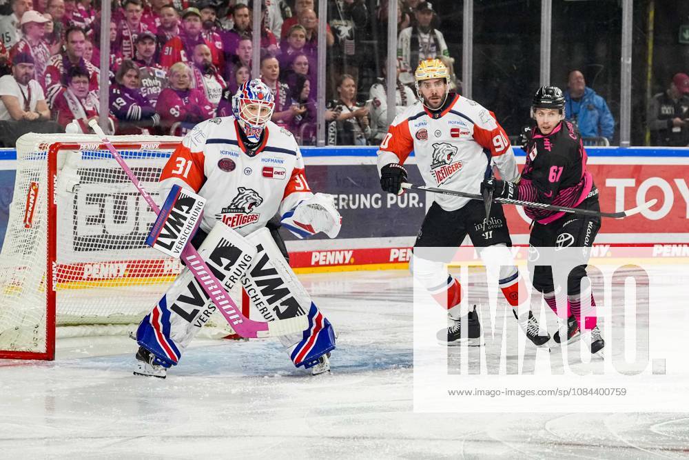 Ice Hockey: Penny DEL, Matchday 8—Cologne Sharks vs. Nuremberg Ice Tigers on October 11, 2026, at the Lanxess Arena in Cologne. Niklas Treutle (Nuremberg), left: Constantin Braun (Nuremberg), center: Markus Ljungh (Cologne), right: In accordance with the regulations of the DEL (German Ice Hockey League), the publication and further use of the images in electronic media and on devices of any kind during the game is not permitted