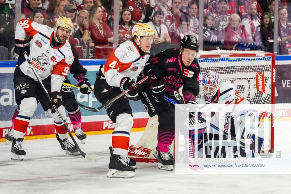 Ice Hockey: Penny DEL, Matchday 8—Cologne Sharks vs. Nuremberg Ice Tigers on October 11, 2026, at the Lanxess Arena in Cologne. From left to right: Constantin Braun (Nuremberg), Owen Headrick (Nuremberg), Juhani Tyrväinen (Cologne), Niklas Treutle (Nuremberg). In accordance with the regulations of the DEL (German Ice Hockey League), the publication and further use of these images in electronic media and on devices of any kind during the game is not permitted.