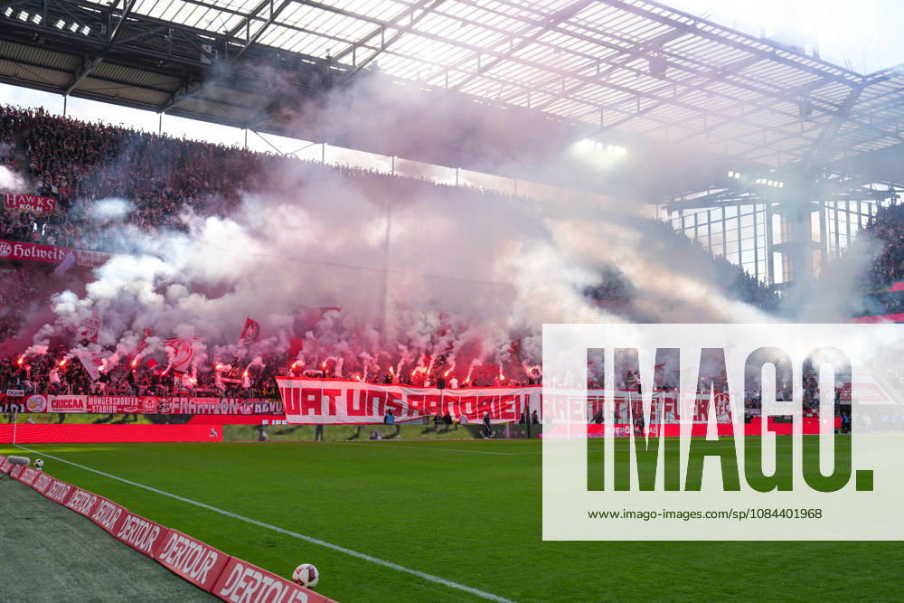Men s, Soccer, Bundesliga 1, 1. FC Köln vs. Borussia Mönchengladbach, 2026–2027 season, RheinEnergieSTADION: 1 FC Köln fans set off pyrotechnics; smoke rises. DFB regulations prohibit the use of photographs as image sequences and or quasi-video.