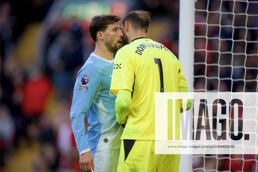 Football - FA Premier League - Liverpool FC v Manchester City FC LIVERPOOL, ENGLAND - Sunday, October 11, 2026: Manchester City s captain Ruben Dias and goalkeeper Gianluigi Donnarumma (R) during the FA Premier League match between Liverpool FC and Manchester City FC at Anfield. (Photo by David Rawcliffe Propaganda) LIVERPOOL Anfield MERSEYSIDE ENGLAND