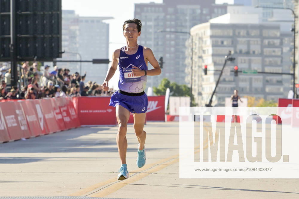 Tomoki Ota of Japan crosses the finish line with a time of 02:11:52 placing 26th over all placing during 2026 Bank of America Chicago Marathon in Chicago on Sunday, Oct. 11, 2026. CHI20261011111 MARKxBLACK