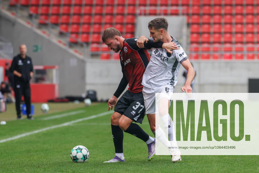Ingolstadt, Germany October 11, 2026 3rd League 2026–2027 Matchday 8 FC Ingolstadt 04 vs. SV Wehen Wiesbaden Pictured from left in a tackle: Benjamin Kanuric (FCI) and Gino Fechner (SVWW). DFB and DFL regulations prohibit any use of photographs as image sequences and or quasi-video