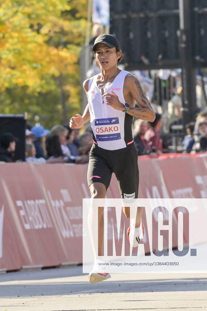 Suguru Osako of Japan crosses the finish line with a time of 02:07:34 placing 14th over all during 2026 Bank of America Chicago Marathon in Chicago on Sunday, Oct. 11, 2026. CHI20261011106 MARKxBLACK