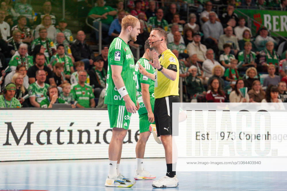 Pictured: Referee talking with Matthes Langhoff of Füchse Berlin, November 25, 2026; Füchse Berlin vs. TVB Lemgo Lippe, HBL, Handball Bundesliga, 2026–27 season, Max Schmeling Halle