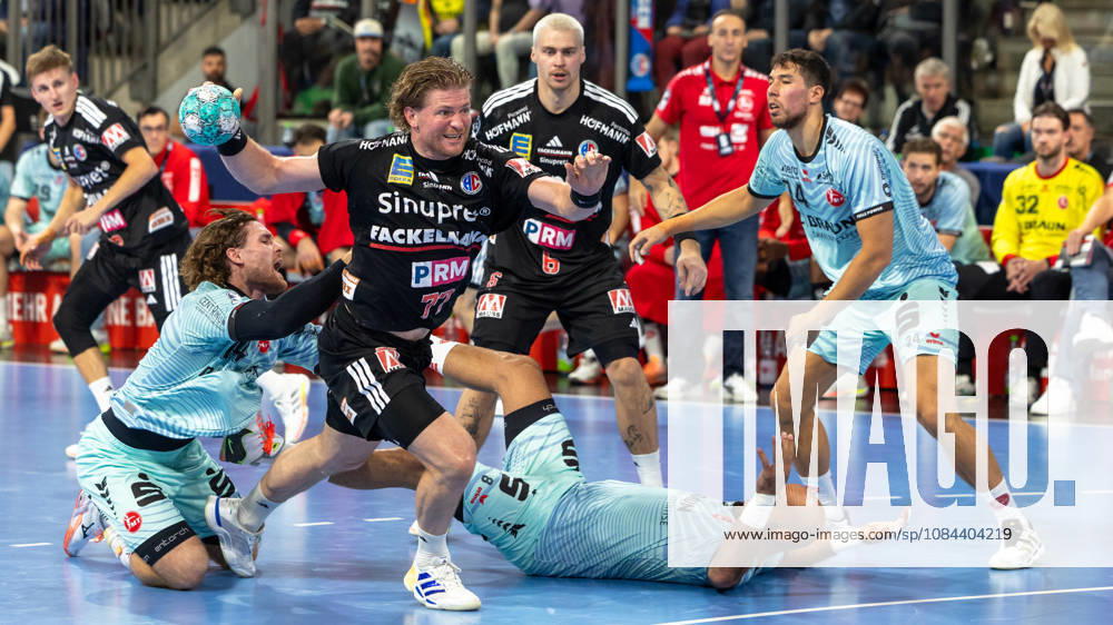 Maciej Gebala of HC Erlangen, No. 77, drives toward the goal; Melsungen s players can t stop him. GER, HC Erlangen vs. MT Melsungen, Handball, Opel Handball Bundesliga, Matchday 8, 2026–2027 season, October 11, 2026 GER, HC Erlangen vs. MT Melsungen, Handball, Opel Handball Bundesliga, Matchday 8, 2026–2027 season, October 11, 2026 Nuremberg