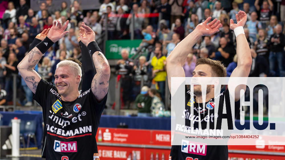 Marek Nissen (HC Erlangen, 06) and Christopher Bissel (HC Erlangen, 21) celebrate after the victory in the match between HC Erlangen and MT Melsungen, handball, Opel Handball Bundesliga, Matchday 8, 2026–2027 season, October 11, 2026, GER, HC Erlangen vs. MT Melsungen, Handball, Opel Handball Bundesliga, Matchday 8, 2026–2027 season, October 11, 2026, Nuremberg