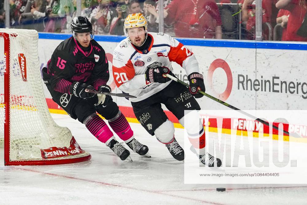 Ice Hockey: Penny DEL, Matchday 8—Cologne Sharks vs. Nuremberg Ice Tigers on October 11, 2026, at the Lanxess Arena in Cologne. Louis Marc Aubry (Cologne), left: Ryan Jones (Nuremberg), right: In accordance with the regulations of the DEL (German Ice Hockey League), the publication and further use of the footage in electronic media and on devices of any kind during the game is not permitted.