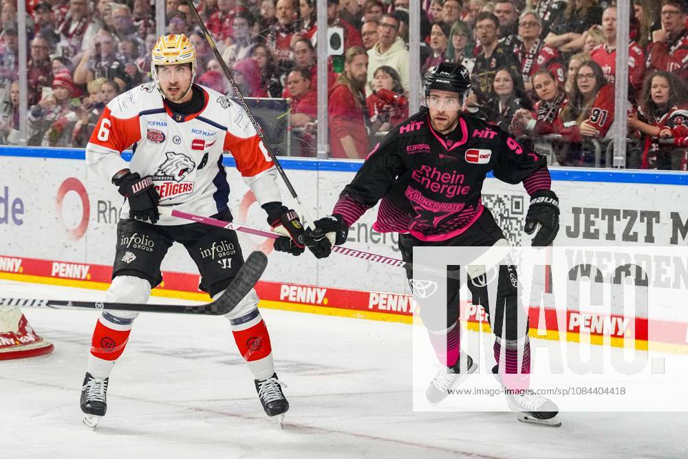 Ice Hockey: Penny DEL, Matchday 8—Cologne Sharks vs. Nuremberg Ice Tigers on October 11, 2026, at the Lanxess Arena in Cologne. Julius Karrer (Nuremberg), on the left, Marcel Noebels (Cologne); on the right, In accordance with the guidelines of the DEL (German Ice Hockey League), the publication and further use of the footage in electronic media and on devices of any kind during the game is not permitted.