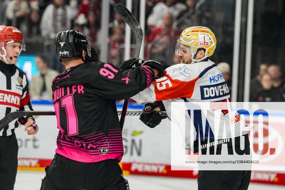 Ice Hockey: Penny DEL, Matchday 8—Cologne Sharks vs. Nuremberg Ice Tigers on October 11, 2026, at the Lanxess Arena in Cologne. Things got rough once again at the end of the final period. Here with Moritz Müller of Cologne, on the left, and Samuel Dove McFall of Nuremberg. According to the regulations of the DEL (German Ice Hockey League), the publication and reuse of the footage in electronic media and on devices of any kind during the game is not permitted.