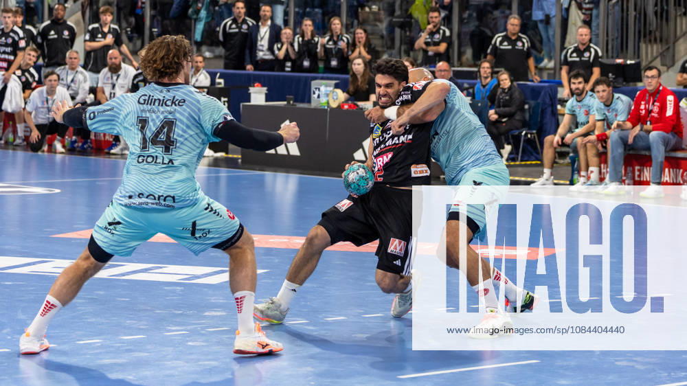 Frieder Bandlow, HC Erlangen, No. 02 in a one-on-one battle, Johannes Golla, MT Melsungen, No. 14 GER, HC Erlangen vs. MT Melsungen, Handball, Opel Handball Bundesliga, Matchday 8, 2026–2027 season, October 11, 2026, GER, HC Erlangen vs. MT Melsungen, Handball, Opel Handball Bundesliga, Matchday 8, 2026–2027 season, October 11, 2026, Nuremberg