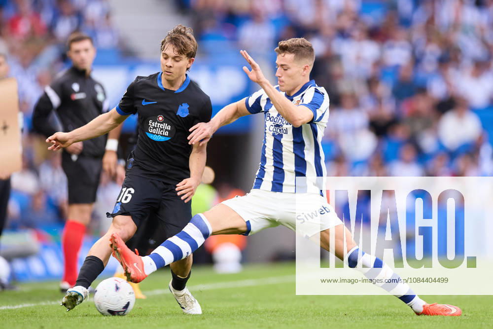 Lorenzo Amatucci of RC Deportivo de A Coruna competes for the ball with Luka Sucic of Real Sociedad during the LaLiga EA Sports match between Real Sociedad and RC Deportivo de A Coruna at Anoeta on October 11, 2026, in San Sebastian, Spain. San Sebastian Spain - ZUMAa181 20261011_zaa_a181_169