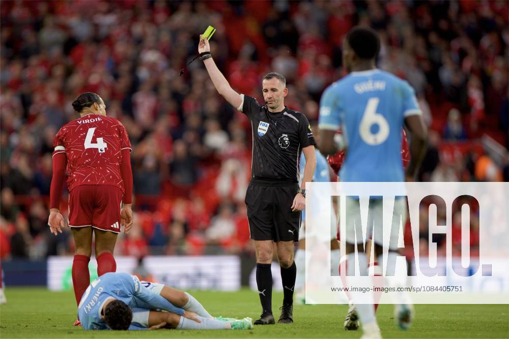 Football - FA Premier League - Liverpool FC v Manchester City FC LIVERPOOL, ENGLAND - Sunday, October 11, 2026: Liverpool s captain Virgil van Dijk is shown a yellow card by referee Chris Kavanagh during the FA Premier League match between Liverpool FC and Manchester City FC at Anfield. (Photo by David Rawcliffe Propaganda) LIVERPOOL Anfield MERSEYSIDE ENGLAND
