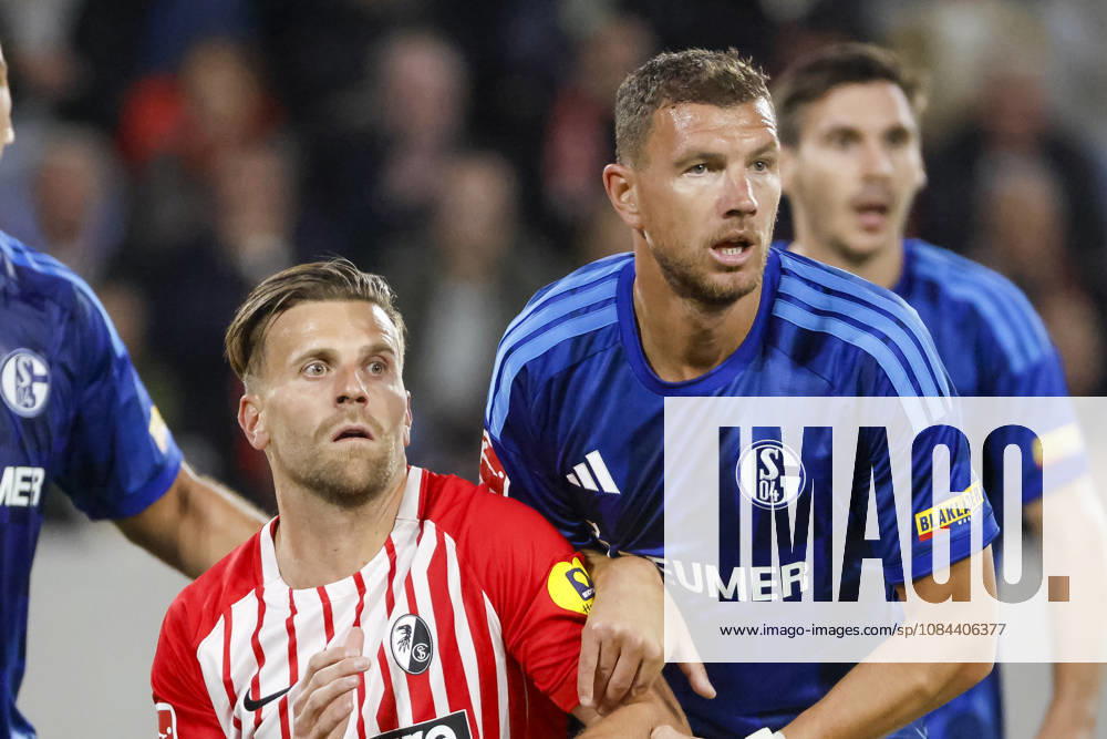 Lucas Höler, SC Freiburg, 09, and Edin Dzeko, FC Schalke, 10, Germany, soccer, Bundesliga 1, Matchday 5, 2026–2027, SC Freiburg vs. FC Schalke 04, October 11, 2026, Freiburg im Breisgau, Europa-Park Stadium, Germany