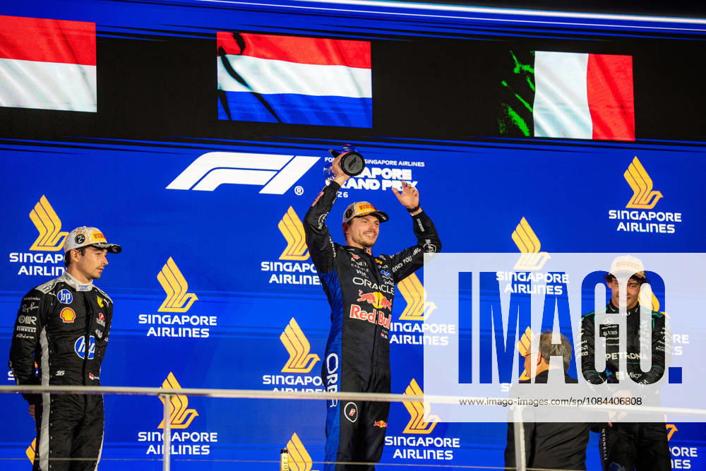 2026 Formula 1 Singapore Grand Prix - Podium MAX VERSTAPPEN 1 (NED) of Oracle Red Bull Racing (Red Bull Racing RB22) with the trophy on Sunday Race Day during the Formula 1 Singapore Airlines Singapore Grand Prix 2026 at Marina Bay Street Circuit, Singapore, on October 11, 2026. Photo by Antoine Lapeyre Reveries Agency via ABACAPRESS.COM Singapore Singapore