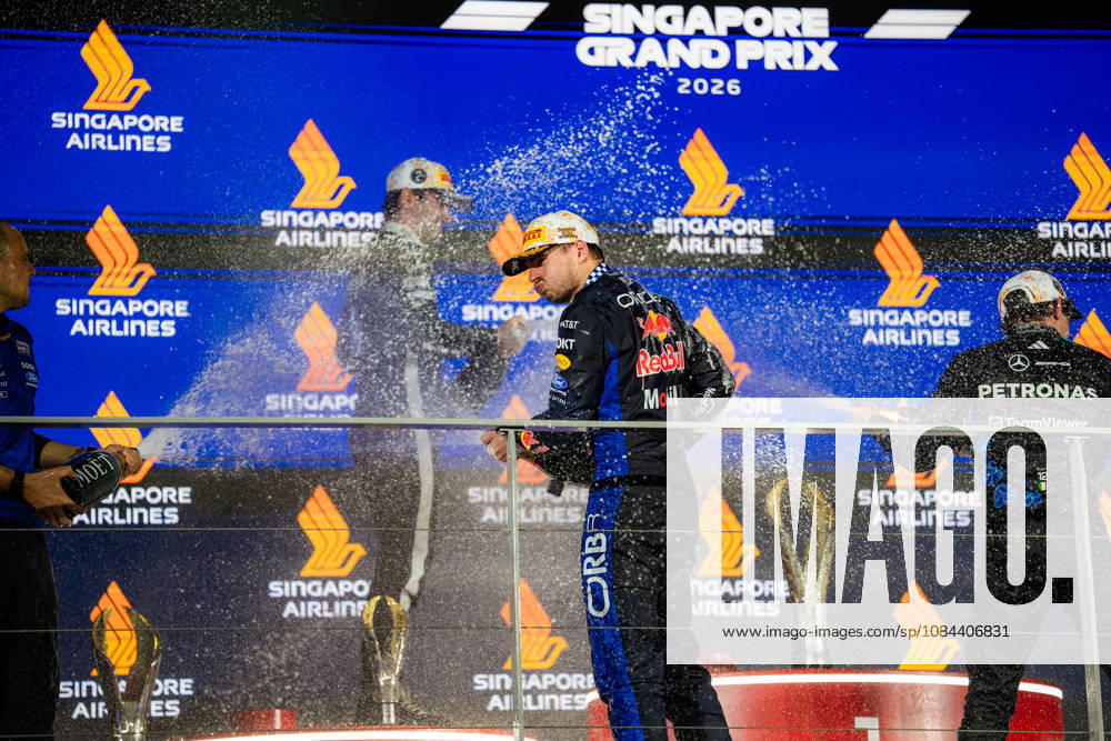 2026 Formula 1 Singapore Grand Prix - Podium CHARLES LECLERC 16 (MON) of Scuderia Ferrari HP (Ferrari SF-26) and MAX VERSTAPPEN 1 (NED) of Oracle Red Bull Racing (Red Bull Racing RB22) champagne celebration on the podium on Sunday Race Day during the Formula 1 Singapore Airlines Singapore Grand Prix 2026 at Marina Bay Street Circuit, Singapore, on October 11, 2026. Photo by Antoine Lapeyre Reveries Agency via ABACAPRESS.COM Singapore Singapore