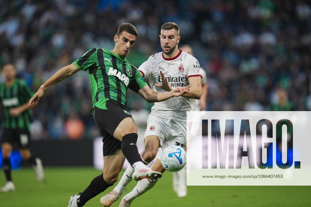 Milan s Strahinja Pavlovic fights for the ball with Sassuolos Ignace Van der Brempt during the Serie A soccer match between Sassuolo and Milan at the Mapei Stadium in Reggio Emilia, north Italy - Sunday, October 11, 2026 -