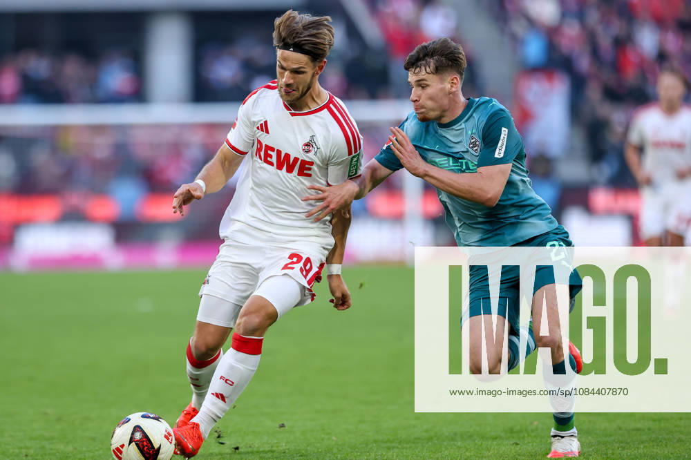 Soccer, Bundesliga, 1. FC Köln vs. Borussia Mönchengladbach, RheinEnergieSTADION, Matchday 5, 2026–2027 Season Jan Thielmann 1 FC Köln 29 in a tackle against Lukas Ullrich Borussia Mönchengladbach 26 DFB regulations prohibit any use of photographs as image sequences and or quasi-video Photo: WilkowskixPressefotoKochx North Rhine-WestGermany