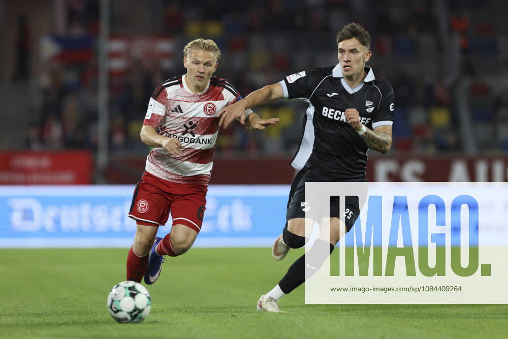 Andreas Mueller of Fortuna Düsseldorf and Tim Heike of SC Verl battle for the ball during the 3. Liga match between Fortuna Düsseldorf and SC Verl at the Merkur Spiel Arena on October 11, 2026, in Düsseldorf, Germany. Photo by Oliver Kaelke, DeFodi Images. Andreas Mueller of Fortuna Düsseldorf and Tim Heike of SC Verl battle for the ball during the 3. Liga match between Fortuna Düsseldorf and SC Verl at Merkur Spiel Arena on October 11, 2026 in Düsseldorf, Germany. Photo by Oliver Kaelke, DeFodi Images. DFB and DFL regulations prohibit any use of photographs as image sequences and or quasi-video. Photo by Oliver Kaelke, DeFodi Images.