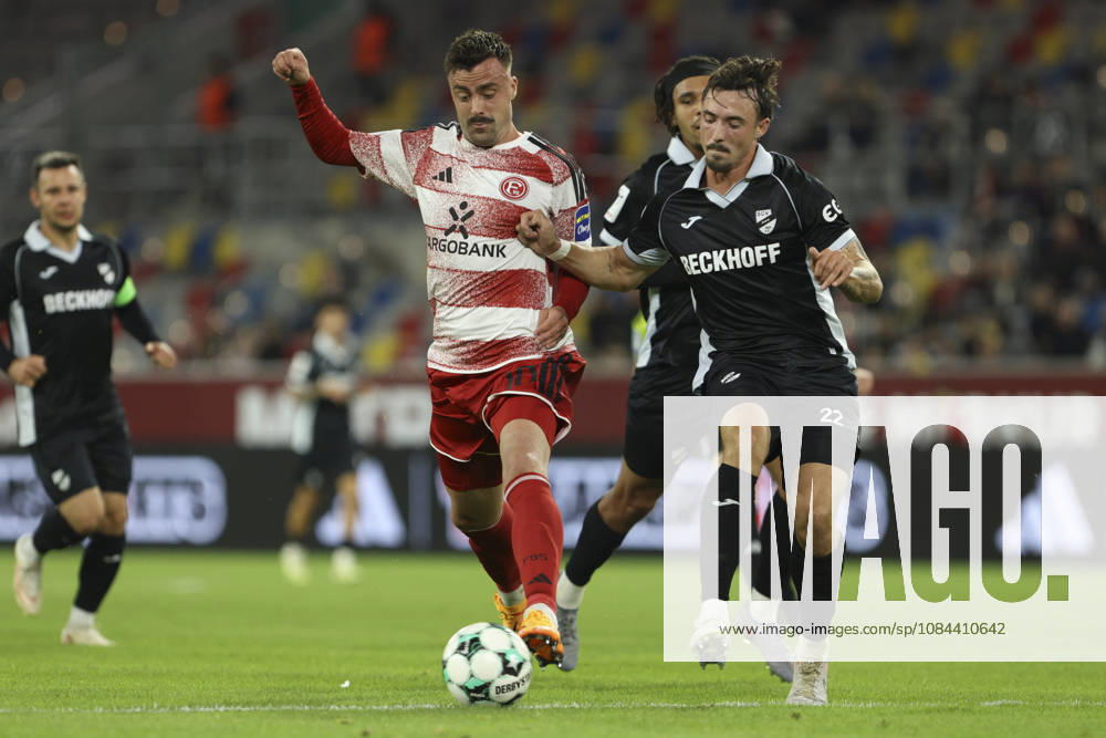 Philipp Foerster of Fortuna Düsseldorf and Noah Koenig of SC Verl battle for the ball during the 3. Liga match between Fortuna Düsseldorf and SC Verl at Merkur Spiel Arena on October 11, 2026, in Düsseldorf, Germany. Photo by Oliver Kaelke, DeFodi Images. Philipp Foerster of Fortuna Düsseldorf and Noah Koenig of SC Verl battle for the ball during the 3. Liga match between Fortuna Düsseldorf and SC Verl at Merkur Spiel Arena on October 11, 2026 in Düsseldorf, Germany. Photo by Oliver Kaelke, DeFodi Images. DFB and DFL regulations prohibit any use of photographs as image sequences and or quasi-video. Photo by Oliver Kaelke, DeFodi Images.