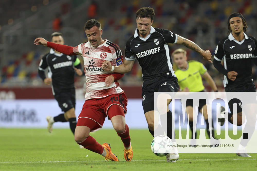 Philipp Foerster of Fortuna Düsseldorf and Noah Koenig of SC Verl battle for the ball during the 3. Liga match between Fortuna Düsseldorf and SC Verl at Merkur Spiel Arena on October 11, 2026, in Düsseldorf, Germany. Photo by Oliver Kaelke, DeFodi Images. Philipp Foerster of Fortuna Düsseldorf and Noah Koenig of SC Verl battle for the ball during the 3. Liga match between Fortuna Düsseldorf and SC Verl at Merkur Spiel Arena on October 11, 2026 in Düsseldorf, Germany. Photo by Oliver Kaelke, DeFodi Images. DFB and DFL regulations prohibit any use of photographs as image sequences and or quasi-video. Photo by Oliver Kaelke, DeFodi Images.