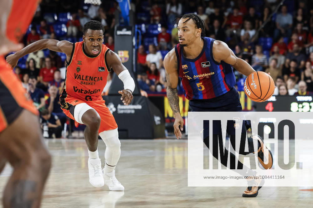 Juntin Robinson of FC Barcelona, Barca and Tj Shorts of Valencia Basket in action during the Spanish League, Liga ACB Endesa, basketball match played between FC Barcelona and Valencia Basket at Palau Blaugrana on October 11, 2026 in Barcelona, Spain. Barcelona Spain - ZUMAa181 20261011_zaa_a181_225