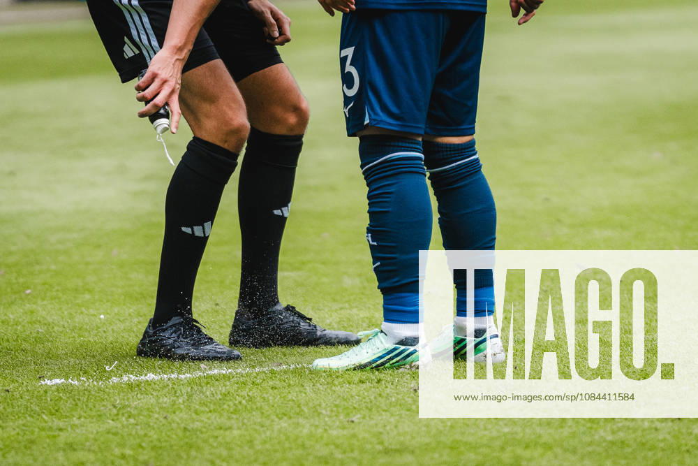 Bochum, Germany October 11, 2026 2. Bundesliga 2026–2027 Matchday 7 VfL Bochum 1848 vs. DSC Arminia Bielefeld Pictured: Referee Konrad Oldhafer marks the distance for the wall with shaving cream; standing in the wall is VVfL player Koji Miyoshi. BOC, DFL, and DFB regulations prohibit any use of photographs as image sequences and or quasi-video. Vonovia Ruhrstadion, North Rhine-Westphalia
