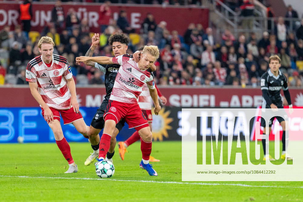 Lukas Bornschein, Fortuna Düsseldorf, 04 and Andreas Mueller of Fortuna Düsseldorf, 06, in a tackle with Andre Leipold of SC Verl, 20. Fortuna Düsseldorf vs. SC Verl, soccer, 3rd Division, Matchday 8, 2026–27 season, October 12, 2026, DFL regulations prohibit any use of photographs as image sequences and or quasi-video. Fortuna Düsseldorf vs. SC Verl, soccer, 3rd Division, Matchday 8, 2026–27 season, October 12, 2026, Düsseldorf